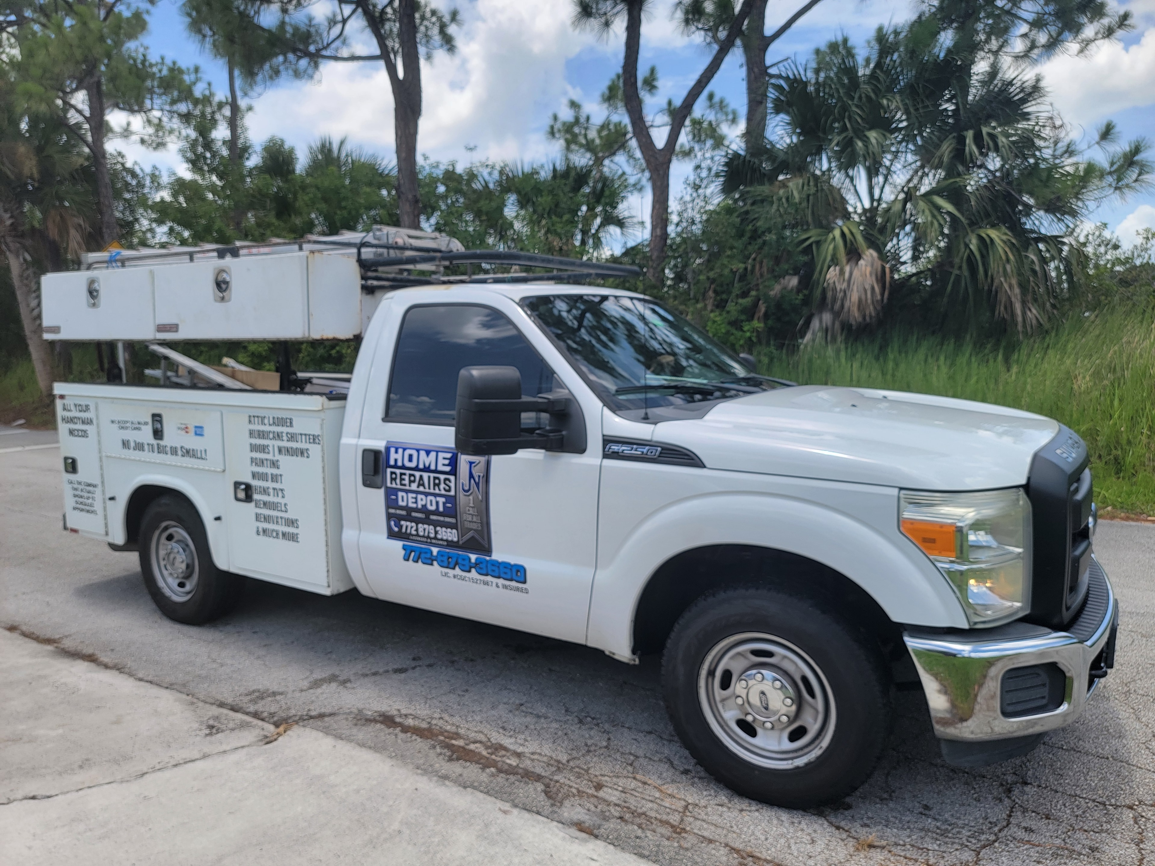 Home Repairs Depot service truck — Home Repairs, Remodels, Handyman Services. Licensed & Insured. 772-879-3660.